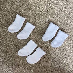 3 piece pair bundle of long white baby socks